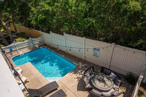 Backyard pool (heated) --  convenient and perfect for cooling off in the summer heat.