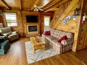 Comfortable living area with 50" TV