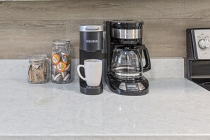 Coffee bar with Keurig and drip coffee maker. Coffee & sugar provided!