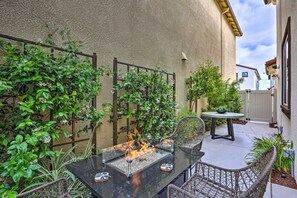 House Exterior | Side Patio w/ Gas Fire Table