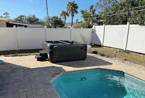 Hot Tub next to the pool so you can jump in and cool down.