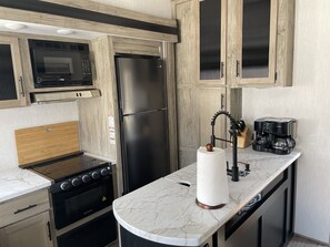 Well appointed kitchen with all the essentials provided.