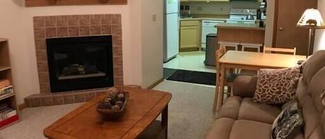 Living room with view into Kitchen