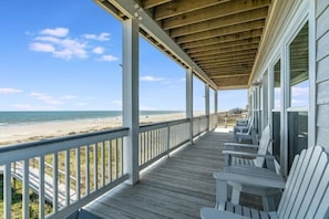 Upper level deck with chairs to relax and enjoy the view