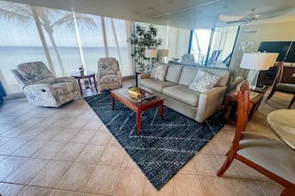 Oceanfront condo with lanai, central AC, W/D, pool, hot tub & beach access