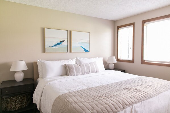 The bedroom has a king size bed with soft bamboo sheets.