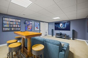 85" tv, and over 500 dvds