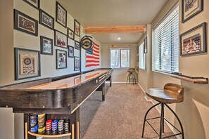 Game Room | Lower Level | Shuffleboard Table | Dart Board | Board Games