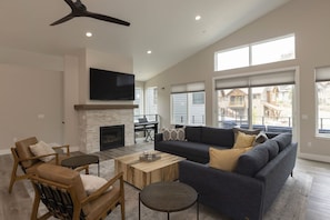 Main Living Space - TV, Gas Fireplace and Deck