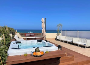 Relax in the jacuzzi while you enjoy the breathtaking view of the Mediterranean