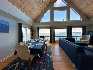 10 person dining area with lake views, adjoins to living room. 