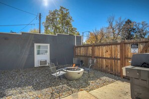Cozy outdoor fire pit with plenty of seating—perfect for roasting marshmallows and enjoying cool Colorado evenings.