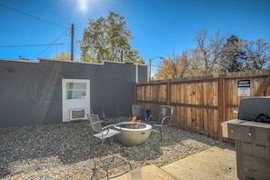 Cozy outdoor fire pit with plenty of seating—perfect for roasting marshmallows and enjoying cool Colorado evenings.