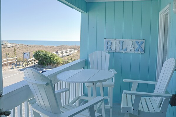 Balcony seating with ocean beach view