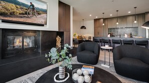 Living room looking into the kitchen and dining area