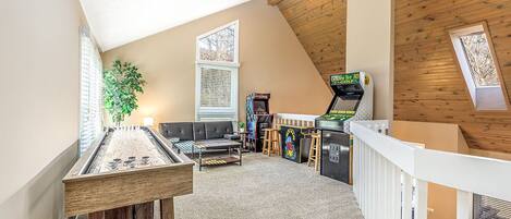 Game room/loft complete with 3 arcade games + shuffle board 