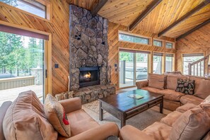 Living Room w/ wood burning fireplace