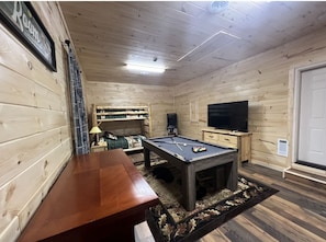 Twin over full bunk bed and game room!
