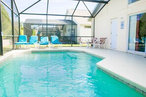 Spacious deck with chairs and loungers