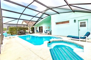 A very large fully screened pool and deck area