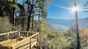 Our new hillside deck in back of home makes you feel like you're in a treehouse!