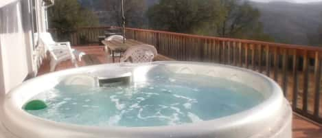 Hot tub with view over valley