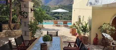 Villa Andreas - Courtyard with swimming pool, seating and dining area and BBQ