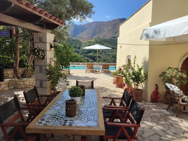 Villa Andreas - Courtyard with swimming pool, seating and dining area and BBQ