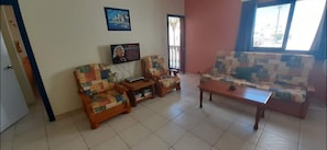 Lounge area, Flat screen TV, DVD player, free wi-fi throughout the apartment.