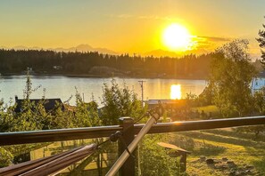 Evenings and mornings are gorgeous from the upstairs deck off the primary bedroom.