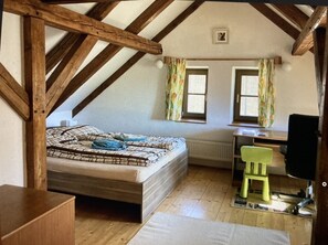 Upstairs bedroom for two with a shared bath