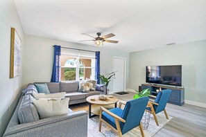 Modern living room. Smart TVs throughout the house