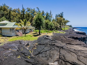 Lava bluffs are all that separate Temple Tree from the ocean