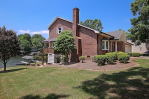 Brick home overlooking water 