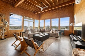 Main Commons - open concept living space with light blocking shades