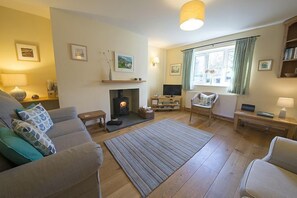 Yewdale Cottage sitting room with log burner