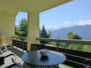 Sky, Furniture, Property, Table, Building, Shade, Porch, Tree, Wood, Interior Design