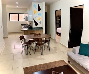 Dinner table + kitchen