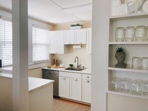 Enjoy the renovated, fully stocked kitchen with brand new appliances. 