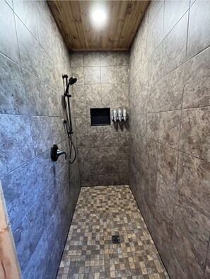 Main bathroom-newly remodeled tiled walk in shower