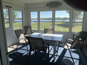 Enjoy the beautiful North Lake views from the screened porch. 