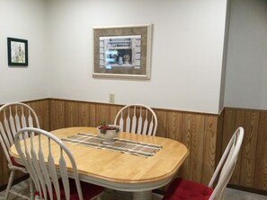 White oak dining table that expands for 8 people. 