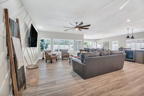 Standing at the Entryway looking into the great room with all the natural light!