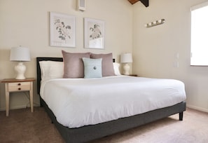 King Bedroom: 100% cotton sheets, closet w fan, dresser, overlooks pond