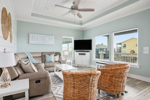 Spacious living room with tons of natural light.