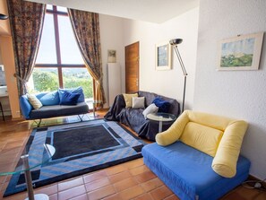 Furniture, Couch, Blue, Azure, Comfort, Picture Frame, Table, Interior Design, Lamp, Living Room