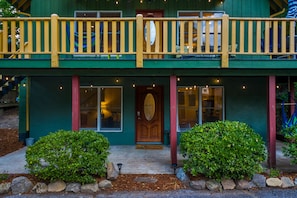 Plenty of relaxation time on Chimney Base Chalet porch in the hammock under the string lights. NEW: Rocking Chairs!