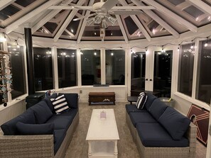 Escape the bugs and mosquitos, sunroom by night