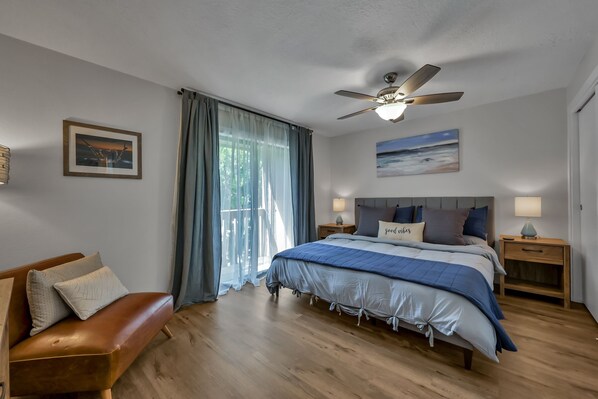 Downstairs master bedroom with private patio area.
