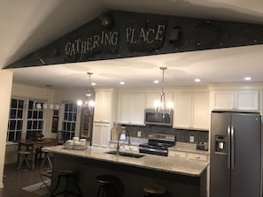 Open kitchen with dining nook